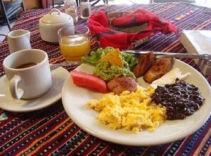 Breakfast, lunch, dinner served; local cuisine