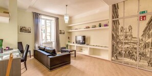 Apartment, 4 Bedrooms | Living room | Flat-screen TV - Basilica San Giovanni (Rome)