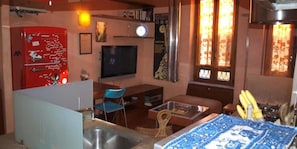 Apartment, 2 Bedrooms, Non Smoking | Living area | Flat-screen TV