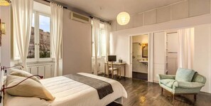 Apartamento panorámico, 1 habitación | 1 dormitorio, escritorio, wifi gratis y ropa de cama