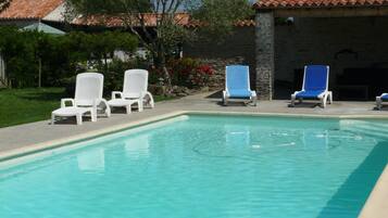 Seasonal outdoor pool, open 11 AM to 8 PM, pool umbrellas, pool loungers