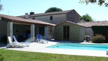 Seasonal outdoor pool, open 11 AM to 8 PM, pool umbrellas, sun loungers