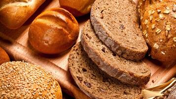 Various types of bread and wheat.