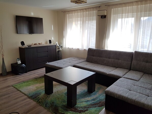 Apartment, 4 Bedrooms | Living area