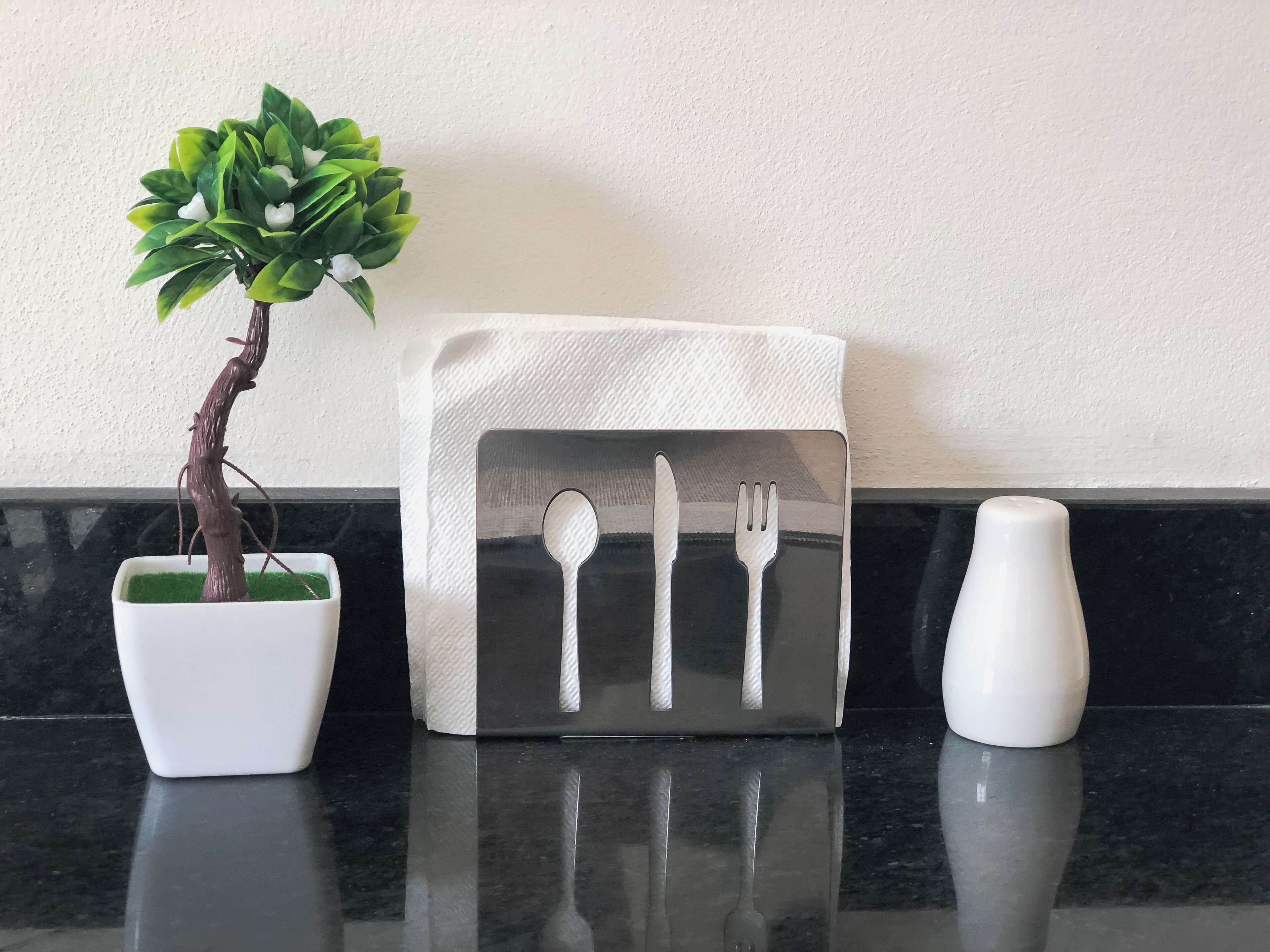 fridge, coffee/tea maker, high chair, cleaning supplies