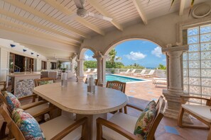 Outdoor dining - Luxurious 4bdr/4 1/2 bath Villa Rental in Orient Bay (Orient Bay)