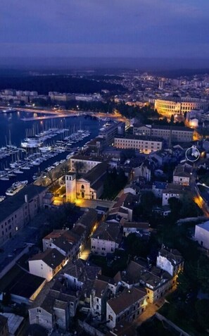 Experience the charm of a coastal town with a marina offering boating activities and a mix of historical and modern architecture.