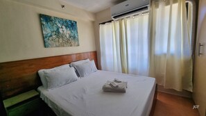 1 bedroom, desk, iron/ironing board, free WiFi - Fully furnished with Self check in, Pool & Netflix  at One Oasis Condominium CDO (Cagayan de Oro)