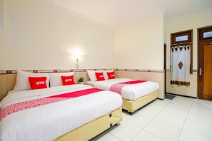 Habitación familiar | Escritorio, wifi gratis, ropa de cama