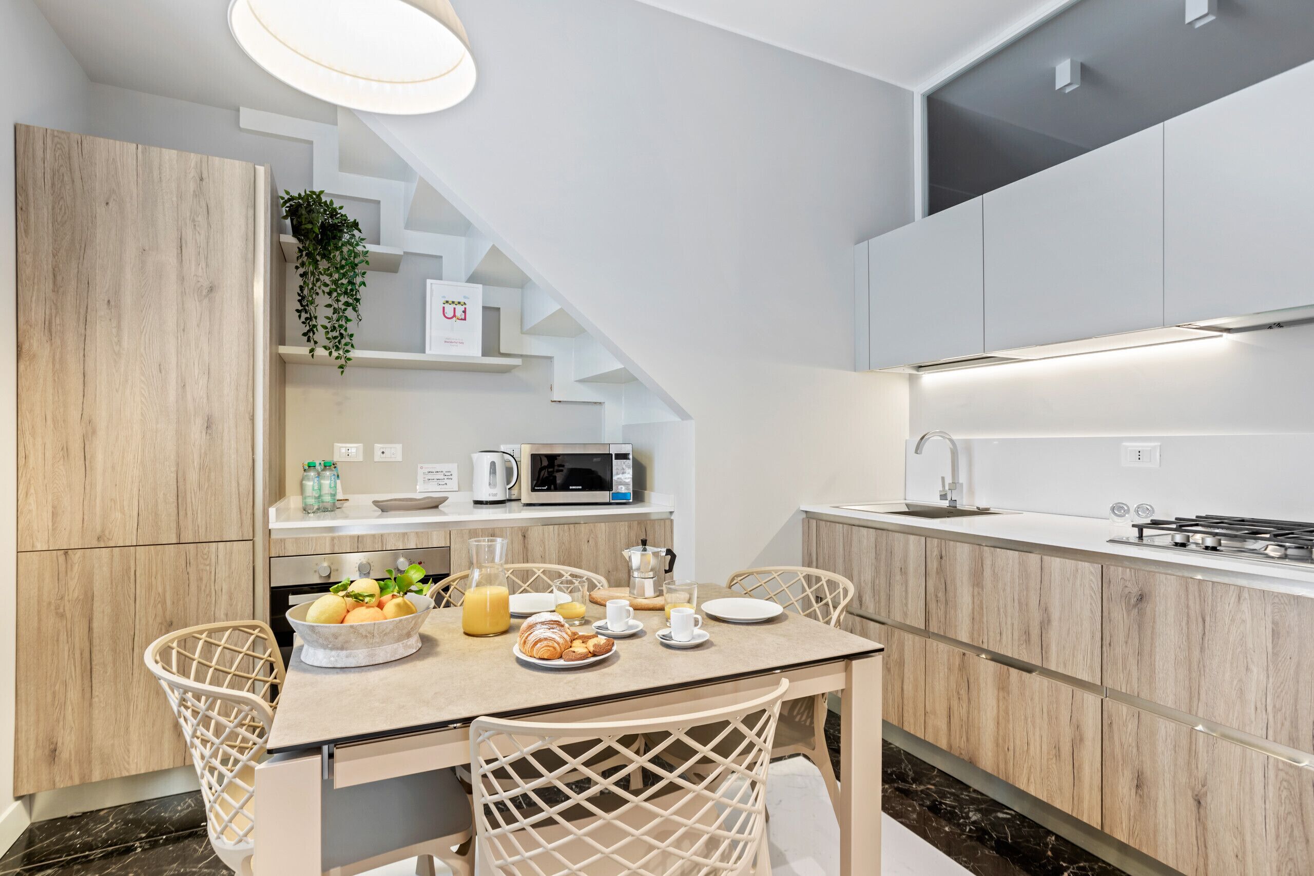 Coffee/tea maker, fridge, microwave, oven