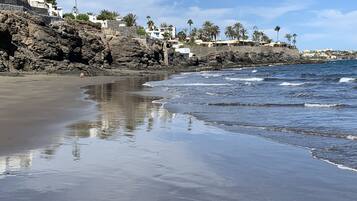 On the beach, sun loungers