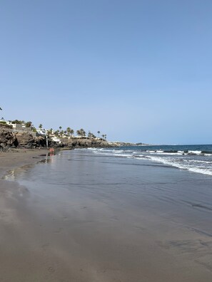 On the beach, sun loungers