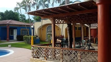 3 outdoor pools, open 8 AM to 9 PM, pool umbrellas, sun loungers