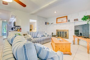 Smart TV, fireplace, books