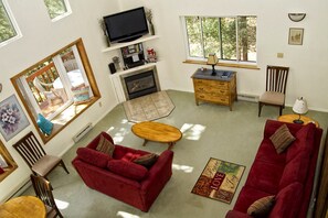 Smart TV, fireplace, DVD player, books