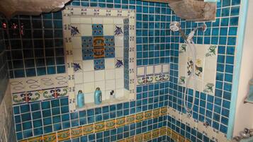 Combined shower/tub, hair dryer, towels, soap