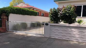 Sliding gate to secure yard. Lickabke if required.