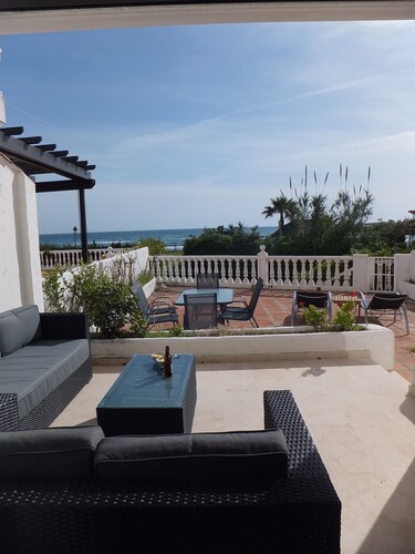 Stunning sea views & large ground floor terrace, 30m from the beach