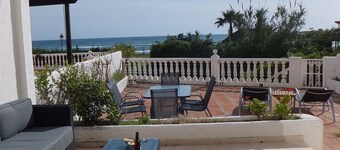 Stunning sea views & large ground floor terrace, 30m from the beach