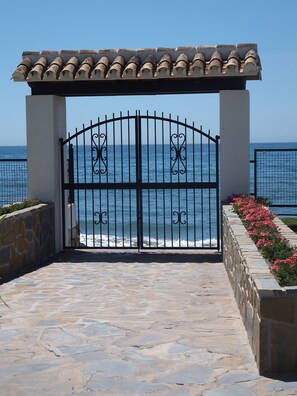 Property grounds - Stunning sea views & large ground floor terrace, 30m from the beach (Marbessa)