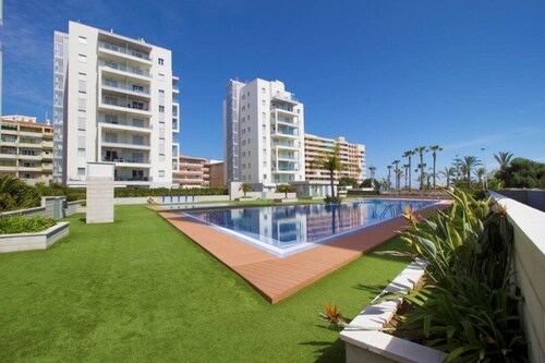 Appartement moderne au rez-de-chaussée avec terrasse de 80 m² + parking à la plage de La Mata