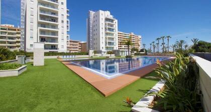 Appartement moderne au rez-de-chaussée avec terrasse de 80 m² + parking à la plage de La Mata