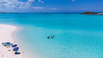 On the beach, sun loungers, beach towels