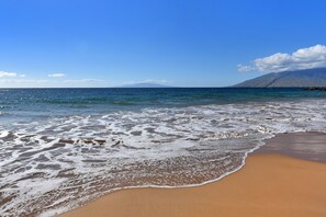 On the beach, sun-loungers, beach towels