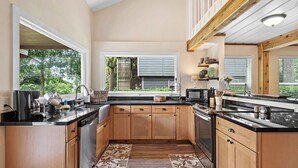 Coffee/tea maker, fridge, microwave, oven - Riverfront Retreat w/ Decks & Views (Baytown)