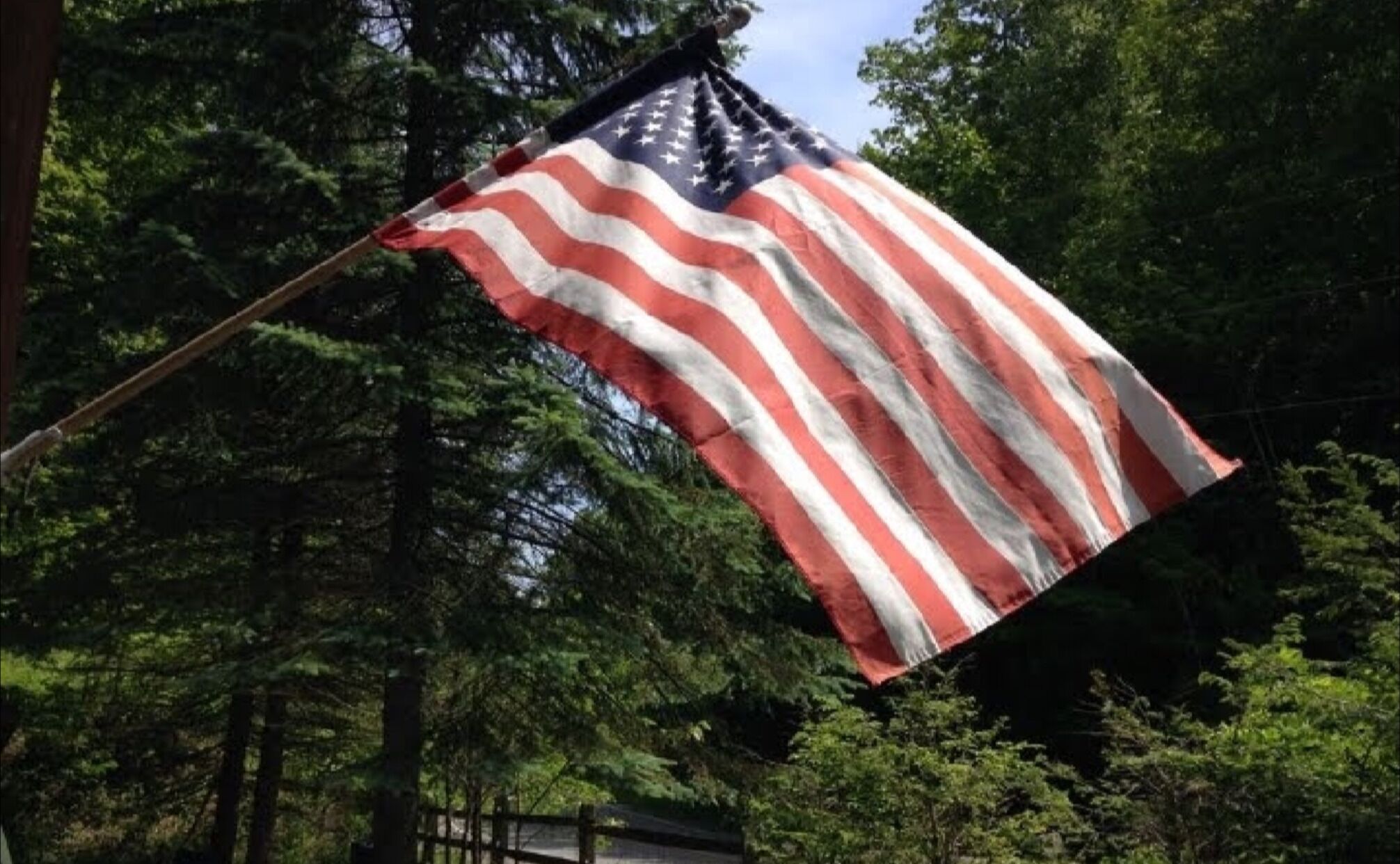 An American flag waving in the wind.