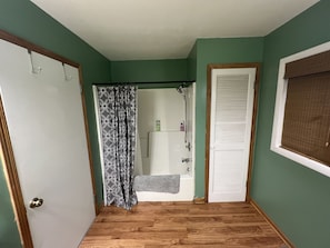Combined shower/tub, hair dryer, towels, soap
