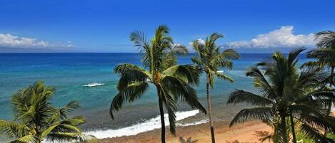 On the beach, sun-loungers, beach towels