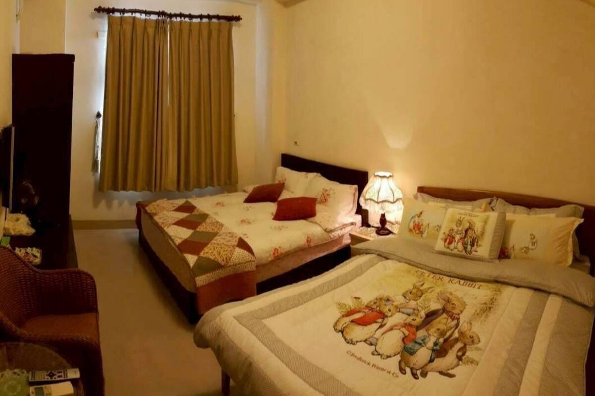 Comfort Quadruple Room, 1 Bedroom, Non Smoking | Down comforters, blackout drapes, soundproofing, iron/ironing board