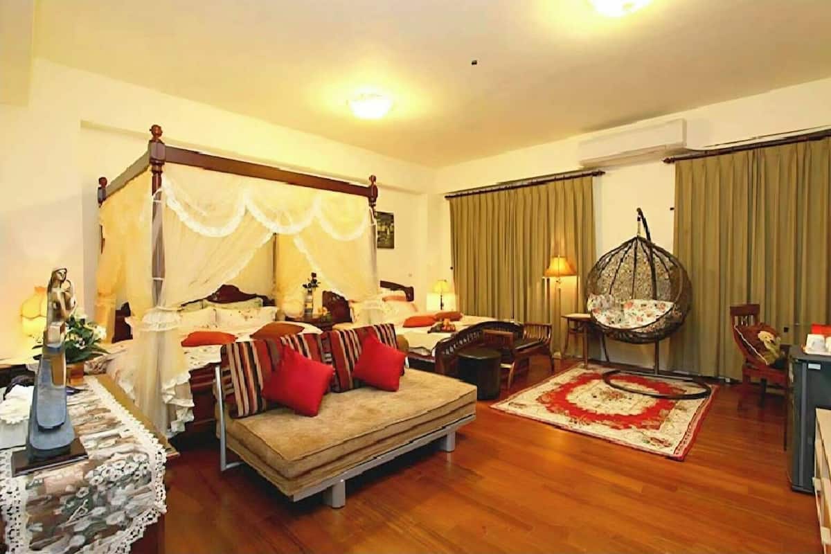 Deluxe Condo, Non Smoking | Down comforters, blackout drapes, soundproofing, iron/ironing board