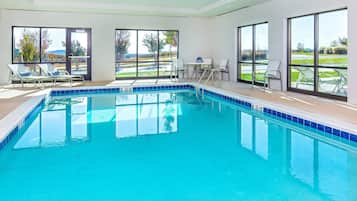 Indoor pool, open 8:00 AM to 10:00 PM, pool loungers