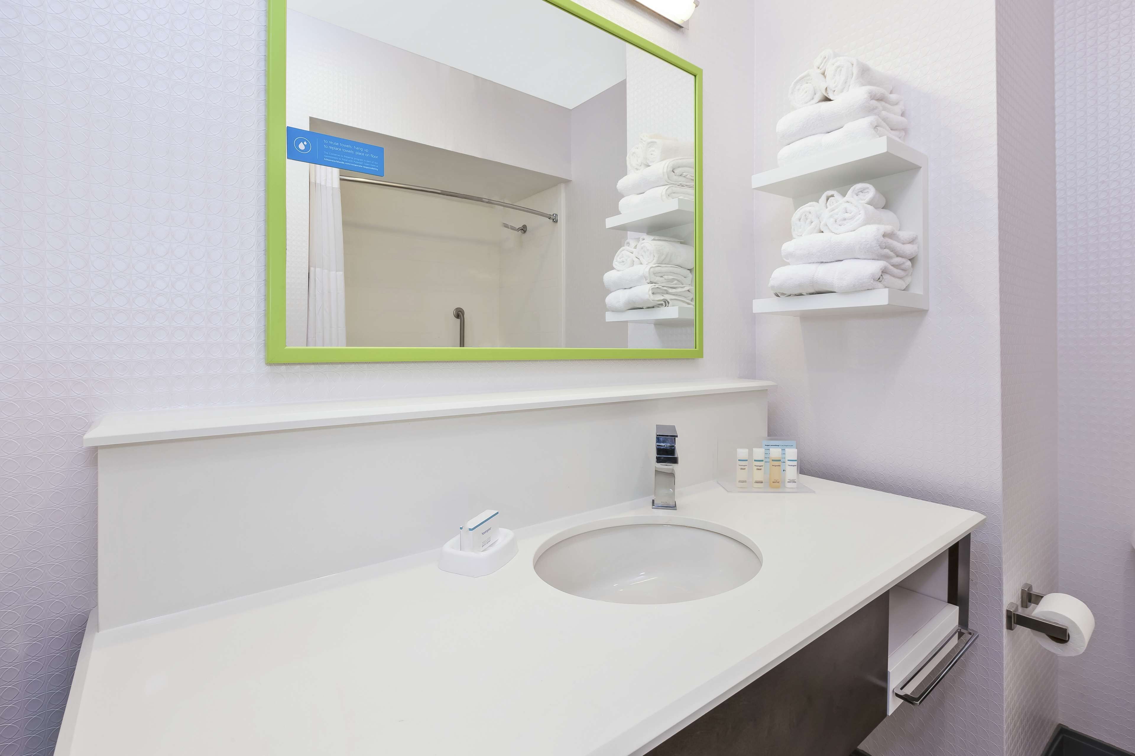 room, 2 queen beds, refrigerator | bathroom shower