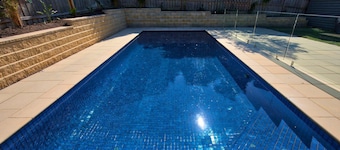 Bluetopia - Contemporary coastal beach house with solar heated pool