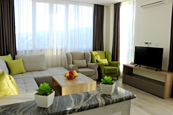 Deluxe Apartment, 2 Bedrooms | Living room | Flat-screen TV - VIP Apartments Sarajevo (Sarajevo)