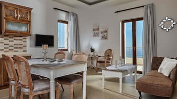 Deluxe-Apartment | Wohnbereich | Plasmafernseher