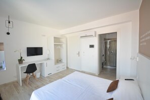 8 dormitorios, minibar, caja fuerte y escritorio