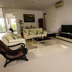 Suite familiar, 4 habitaciones, para no fumadores | Sala de estar