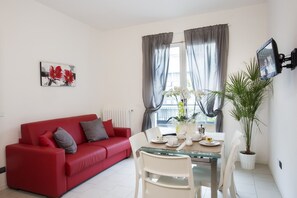 Appartement, 1 chambre | Coin séjour | Télévision à écran plat