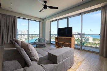 Suite, 1 Bedroom, Marina View (Balcony) | In-room safe, desk, soundproofing, iron/ironing board at Renaissance Cancun Resort & Marina