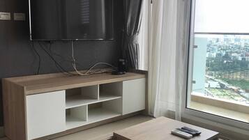 Condo, 1 Large Single Bed, Smoking | Living room | LCD TV