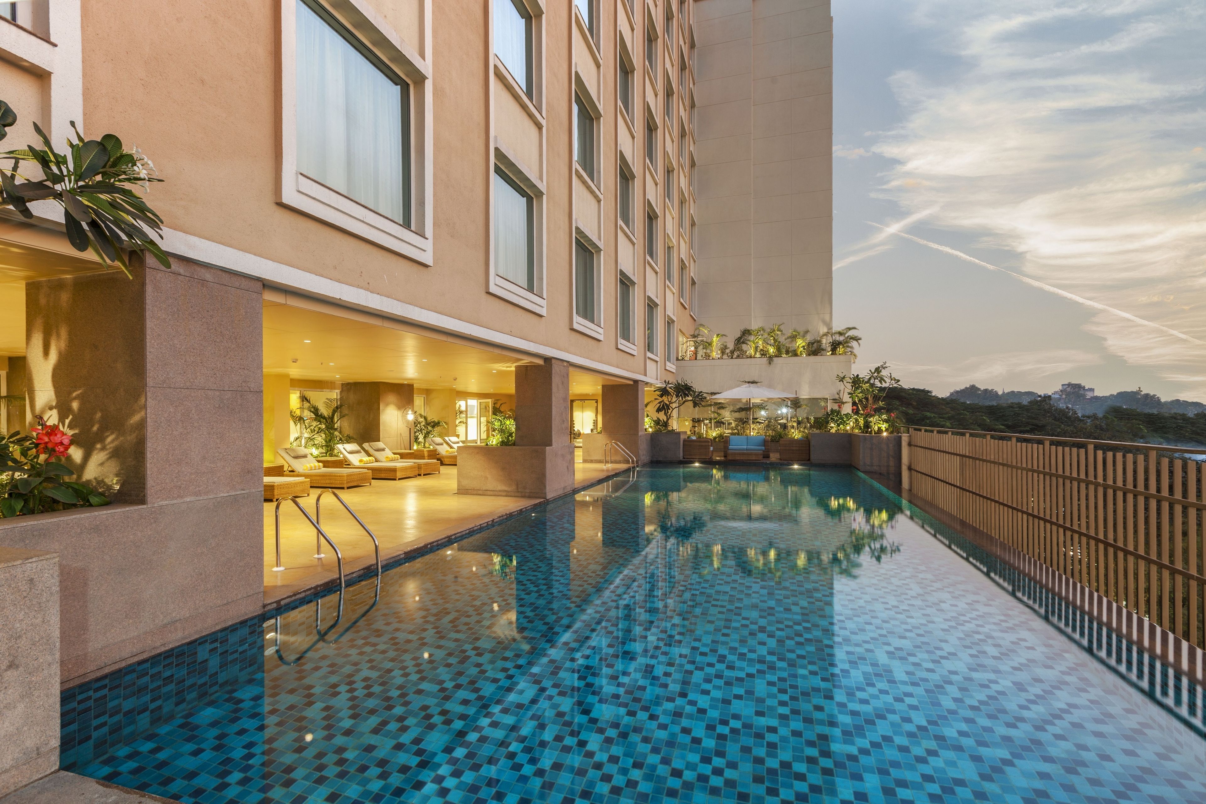 outdoor pool, pool umbrellas, pool loungers