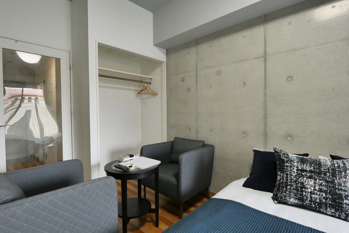 Apartment, 2 Double Beds, Non Smoking, City View | 1 bedroom, blackout drapes, WiFi (free), individually decorated