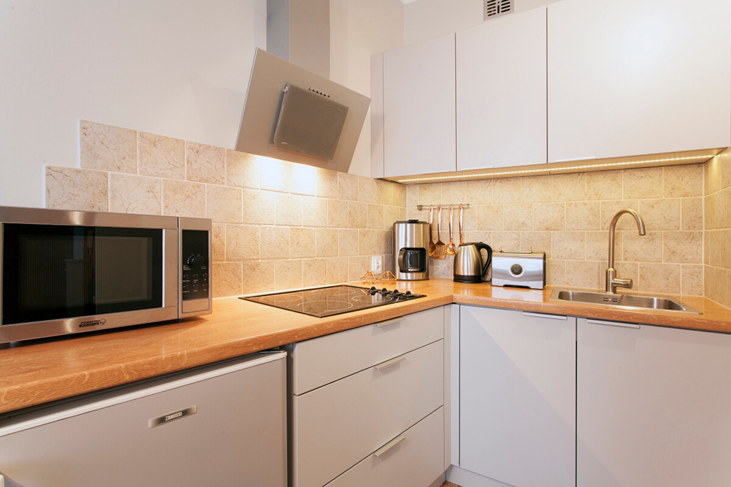 design apartment, 1 double bed with sofa bed, accessible, non smoking | private kitchen | full-sized fridge, microwave, stovetop, coffee/tea maker