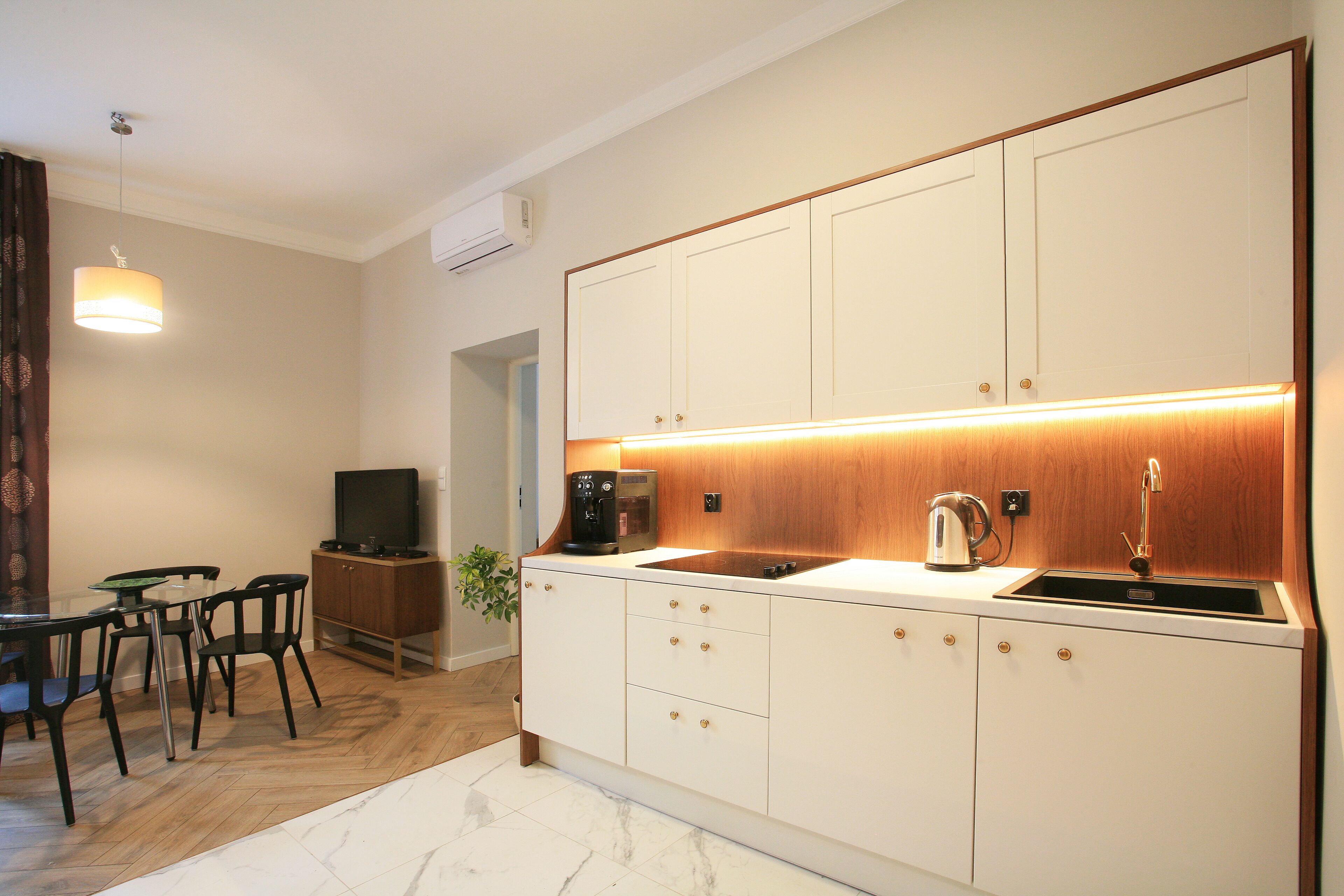 premium apartment, 2 bedrooms, kitchen, city view | living area | 50-cm flat-screen tv with satellite channels, tv, dvd player