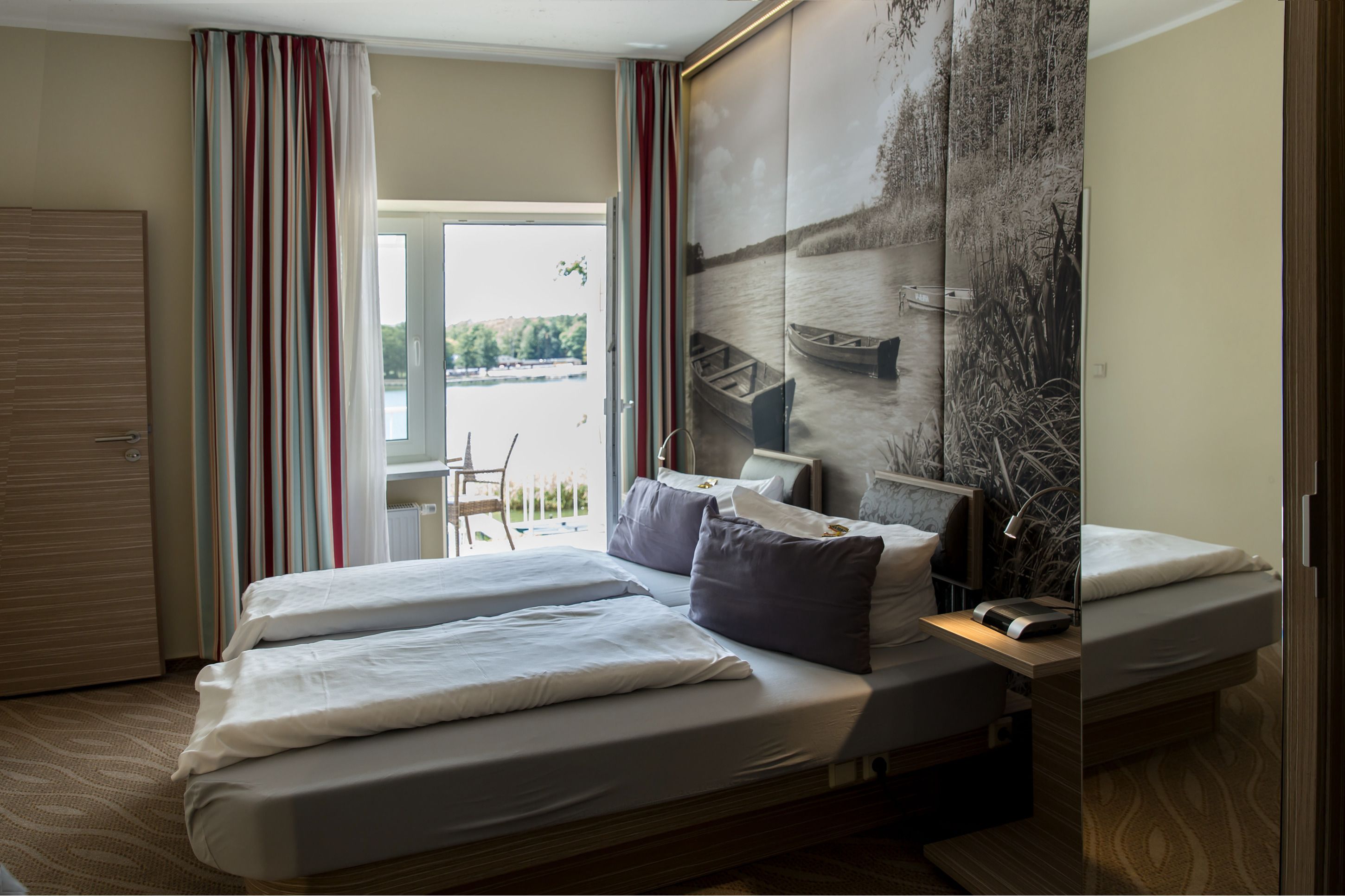 Double Room, Balcony, Lake View | Bathroom amenities | Shower, rainfall showerhead, hair dryer, towels