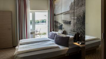 Double Room, Balcony, Lake View | Bathroom amenities | Shower, rainfall showerhead, hair dryer, towels